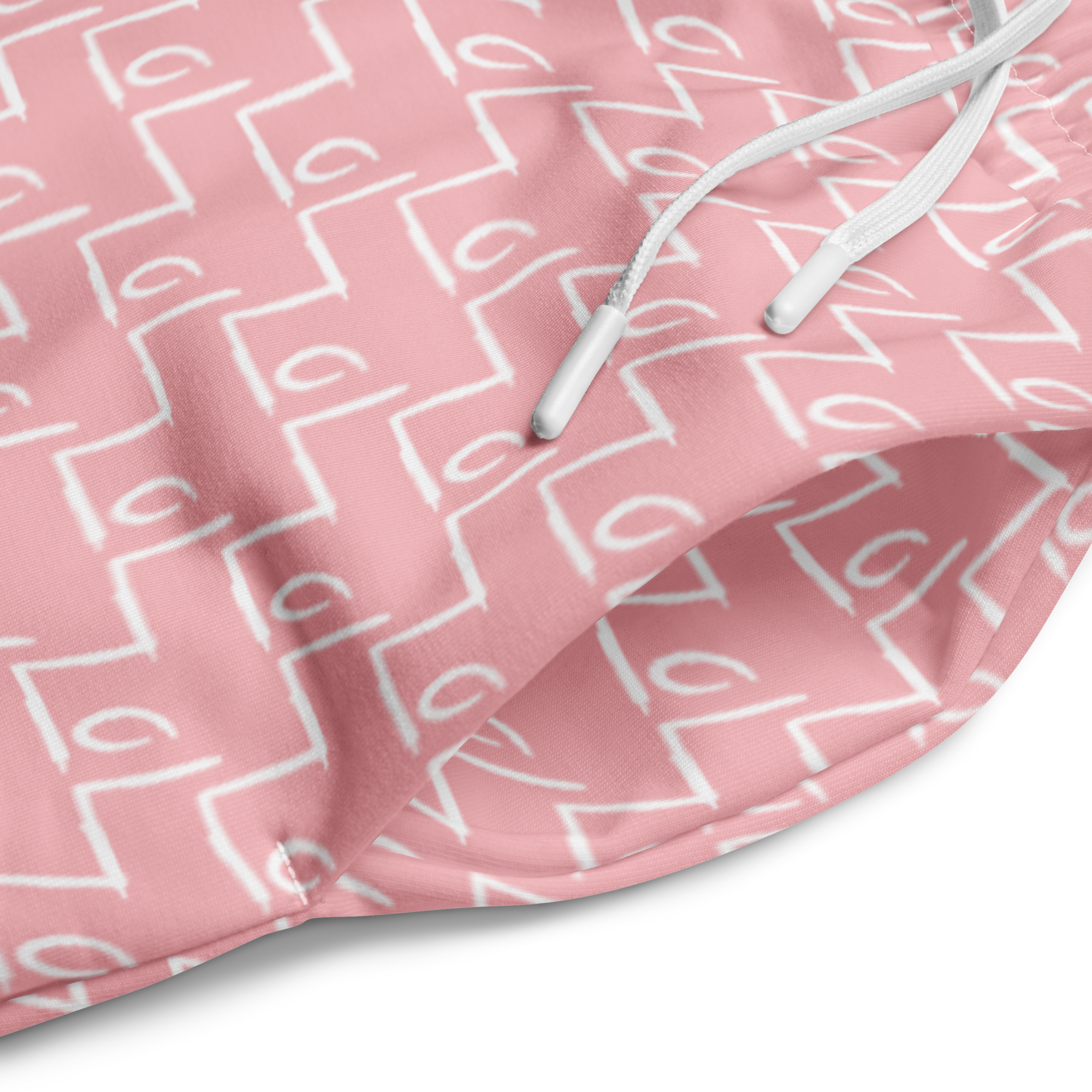 Close-up of pink LoL sweatpants with all-over LoL logo print
