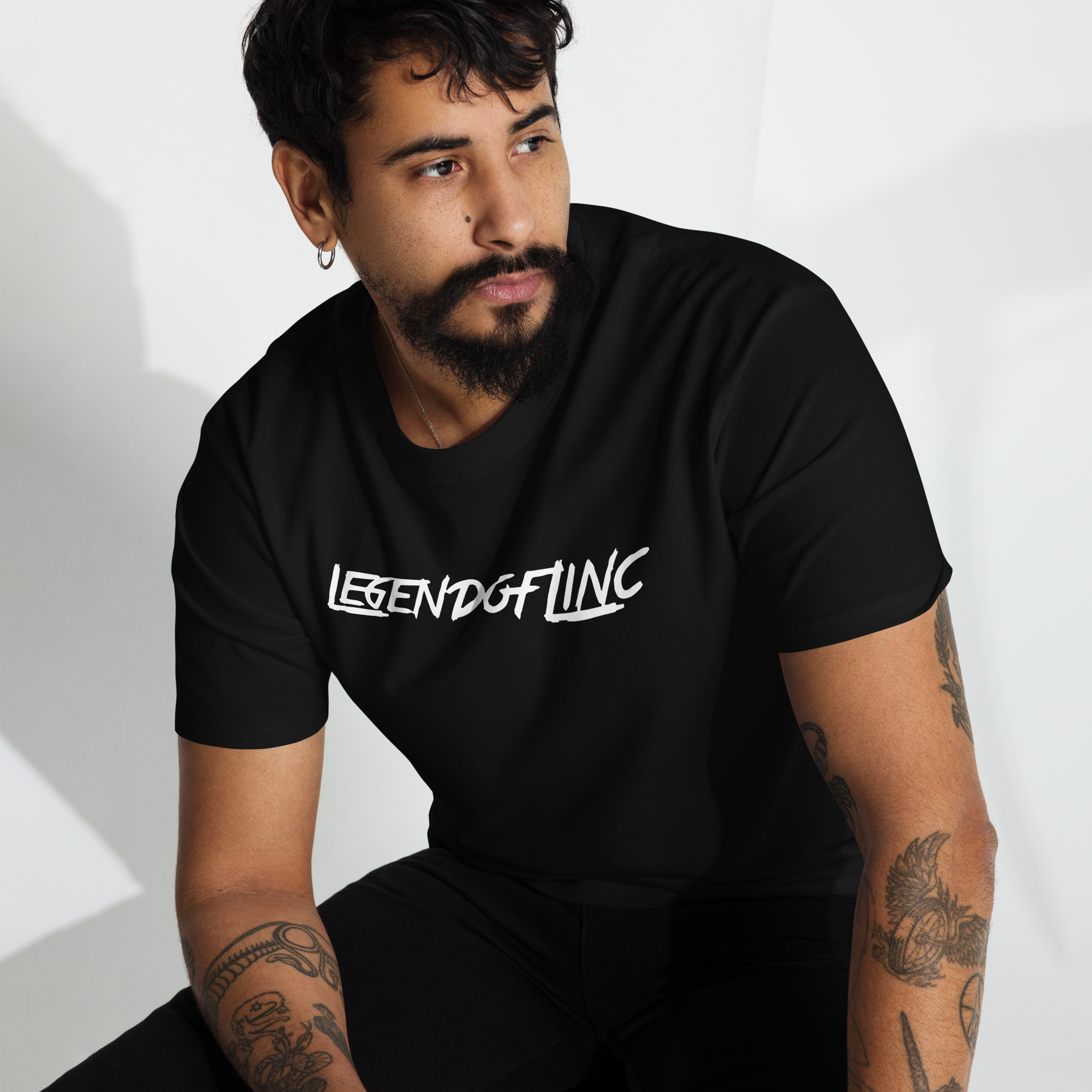 Front view of black LegendofLinc t-shirt with white LegendofLinc logo design, image 2
